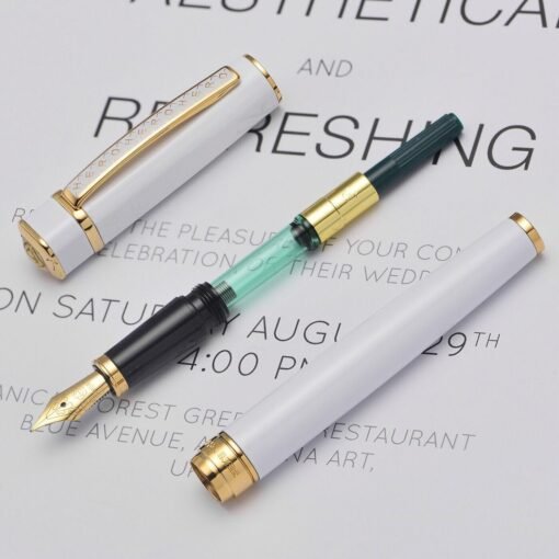 HERO 979 White Gold Fountain Pen – Elegant Writing InstrumentExperience the perfect blend of sophistication and functionality with the HERO 979 White Gold Fountain Pen. Designed for professionals and enthusiasts alike, this pen offers a smooth writing experience complemented by a luxurious aesthetic.​  Key Features:  Elegant Design: The pen features a sleek white body adorned with gold trims and a gold-plated clip, exuding a timeless and professional appeal. - Image 3