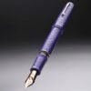 Leonardo MZ Grande 2.0 Dragon Skin Purple RGT with No. 8 14K gold Broad nib, piston filler, ebonite feed and 1.5 ml ink capacity.